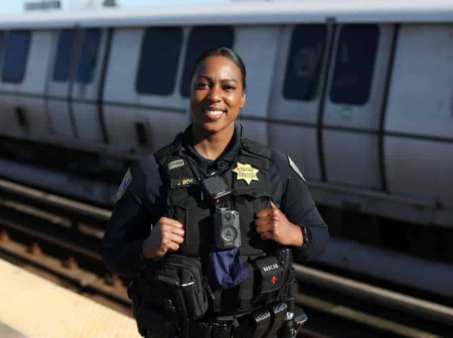 BART PD Recruiter at train platform.