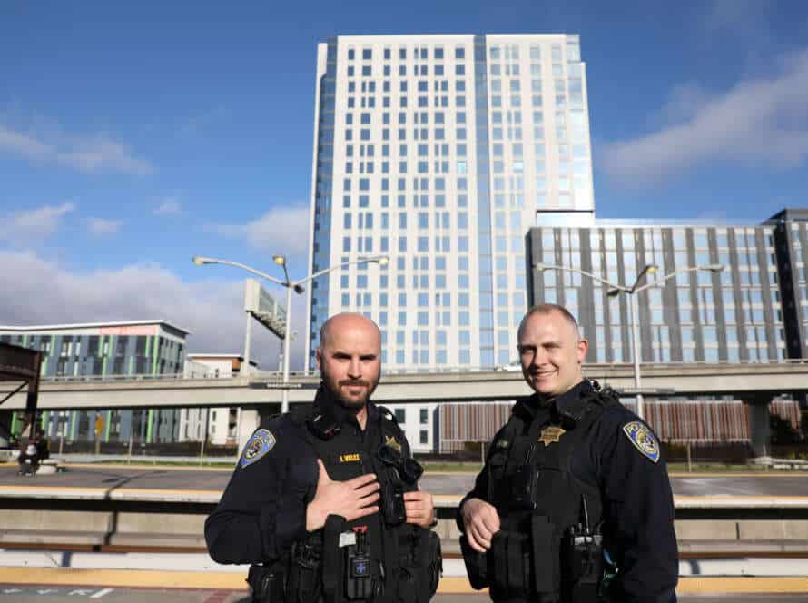 BART PD recruiters on train platform.